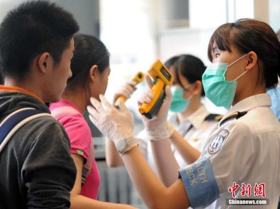 资料图：香港特区政府高度关注中东呼吸综合征的最新发展，并已加强各项防疫工作。中新社发 谭达明 摄