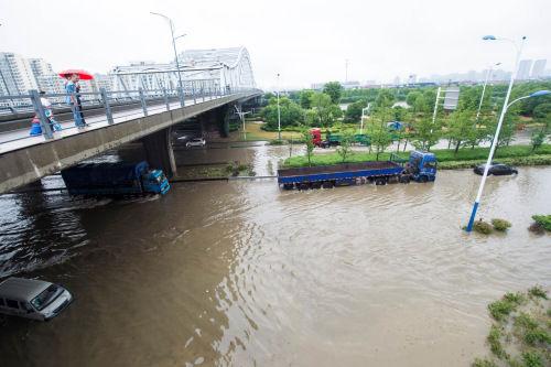 南方强降雨致多省份遇洪灾 致9人死亡6人失踪(图)