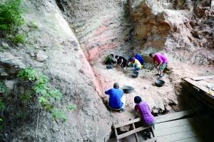 周口店新出土近万件标本 发现“北京人”用火新证