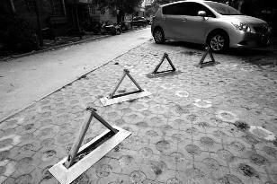 郑州一小区车位售70万 街头大量新建停车场闲置