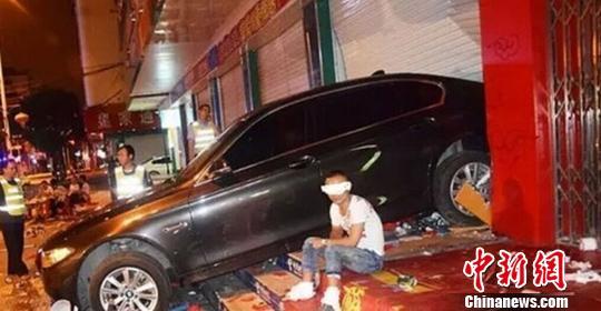 广西宝马车女司机倒行撞死1人被判赔偿48万元