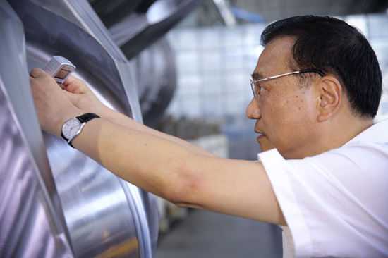 李克强在辽宁考察时强调:集众智汇众力攻坚克难