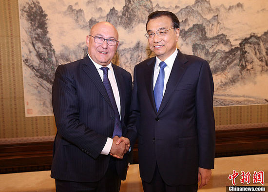 9月18日下午，中国国务院总理李克强在北京中南海紫光阁会见来华出席第三次中法高级别经济财金对话的法国财长萨班。中新社发