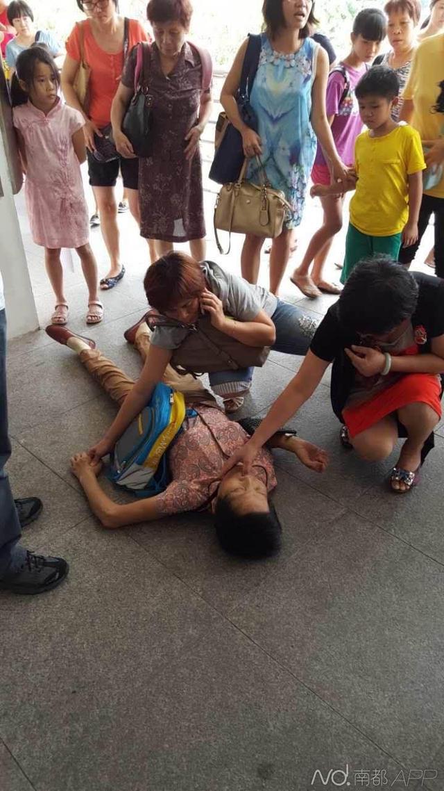 广州老奶奶晕倒 众市民热心相助