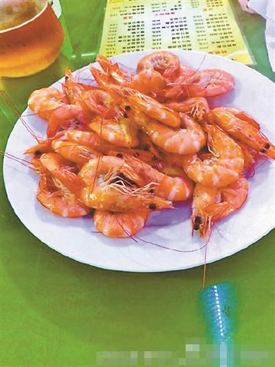青岛天价虾游客被宰 店主称38元一只很便宜(图)