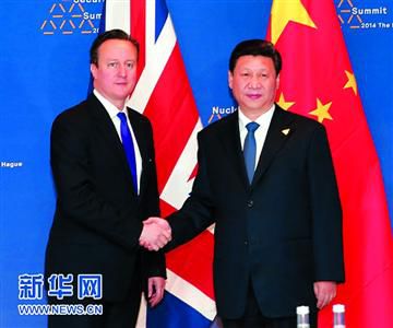 2014年3月,习近平在荷兰会见英国首相卡梅伦。