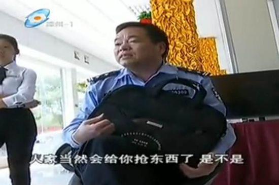 处警民警王良智。