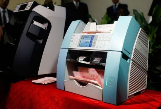 新型验钞机亮相：贪官受贿可查清赃款出处去向
