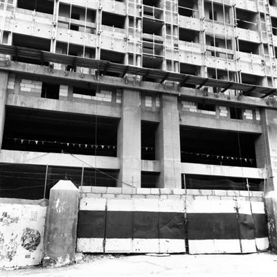 “最牛开发商”被查 65层高楼成国内“第一拆”