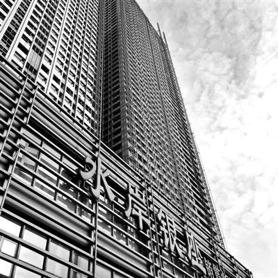 “最牛开发商”被查 65层高楼成国内“第一拆”