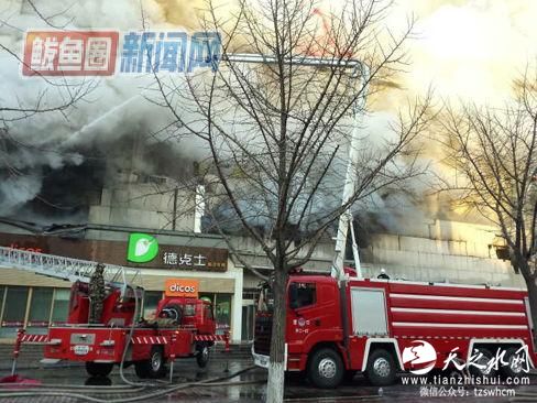 辽宁鲅鱼圈区商业大厦发生火灾 暂无人员伤亡(图)