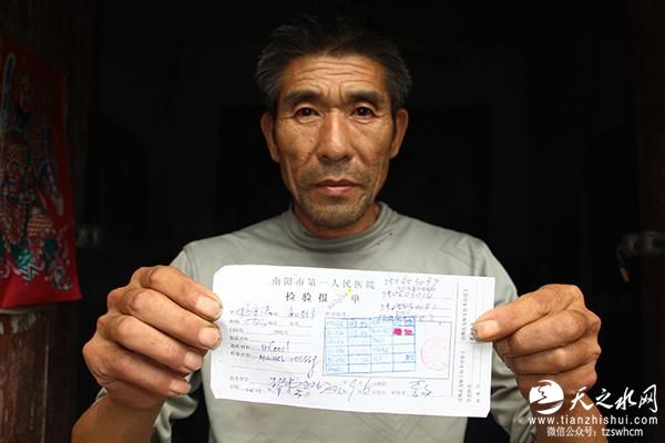 河南农民被误诊艾滋病10年 妻离子散生活困苦