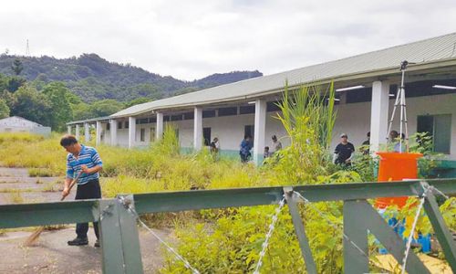 今年8月1日，台军方派人与得标厂商进行坪林阵地开工前财产点交程序整地。（图片来自台湾“中时电子报”）