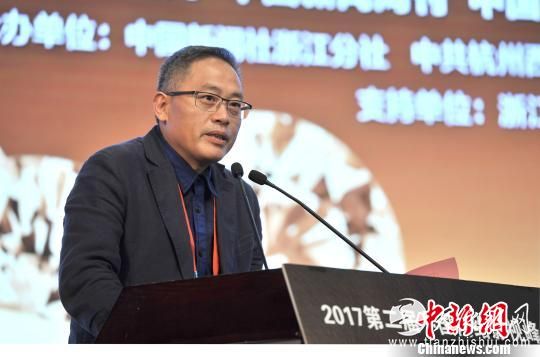 图为杭州市西湖区委常委、宣传部长吴向前发言 胡哲斐 摄